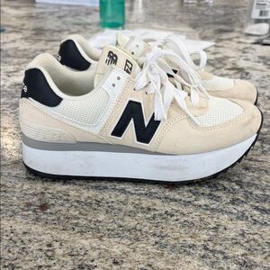 New Balance Cream and Black Sneakers